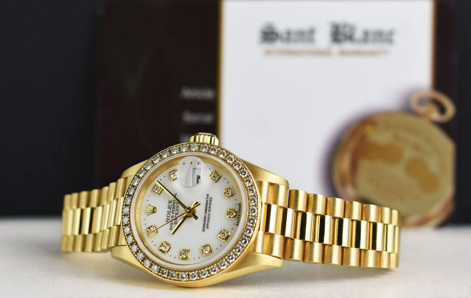 ROLEX Ladies 26mm 18kt Gold President White Dial Diamond Bezel Model 69178