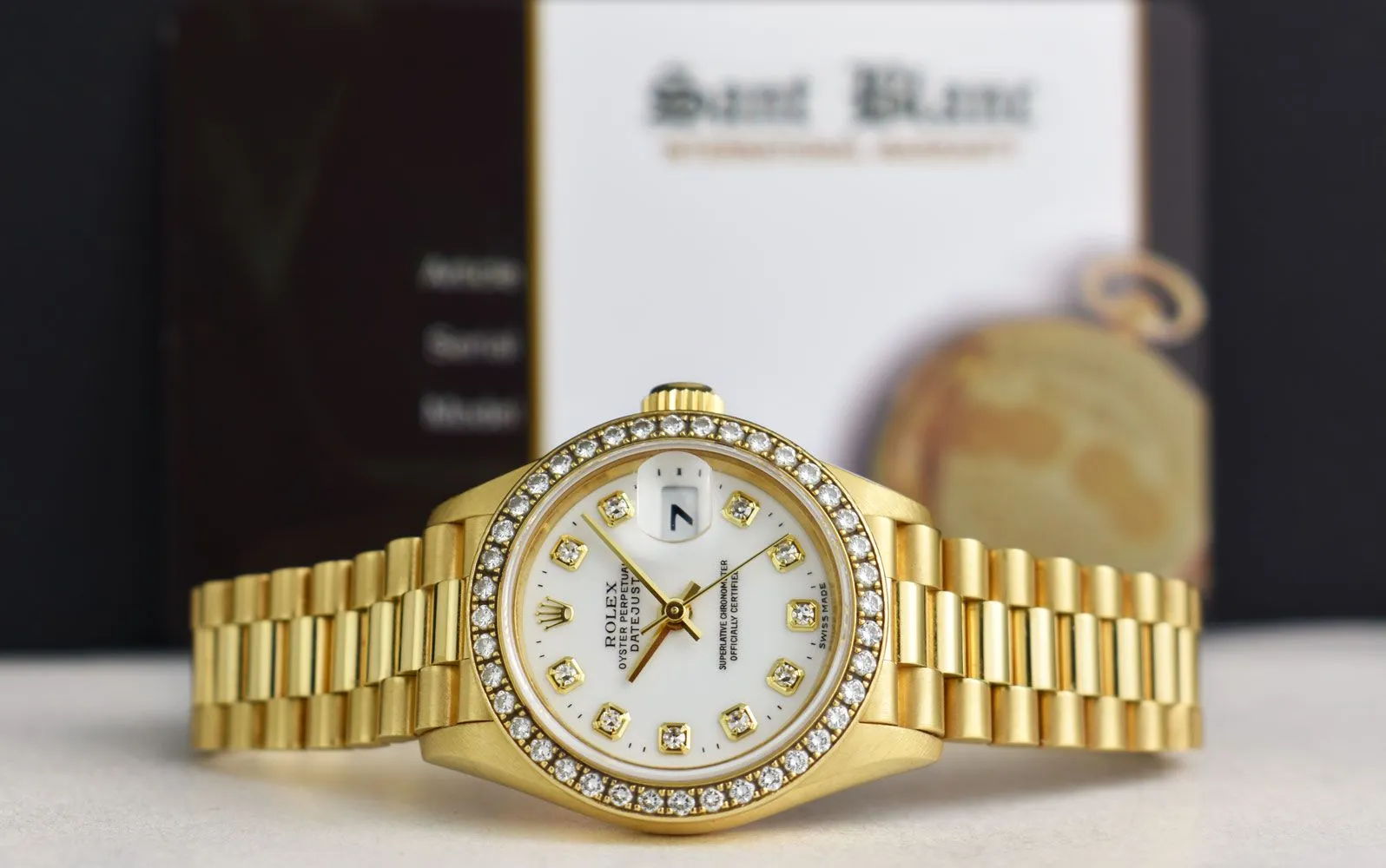 ROLEX Ladies 26mm 18kt Gold President White Dial Diamond Bezel Model 69178
